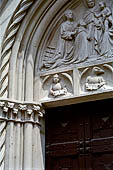 Castiglione Olona -  Lunetta del portale maggiore della Collegiata, (1428). 